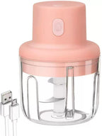 Pink handheld chopper with USB cable on a white background